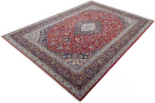 Corner detail of New Kashan rug showing border pattern and Cork pile