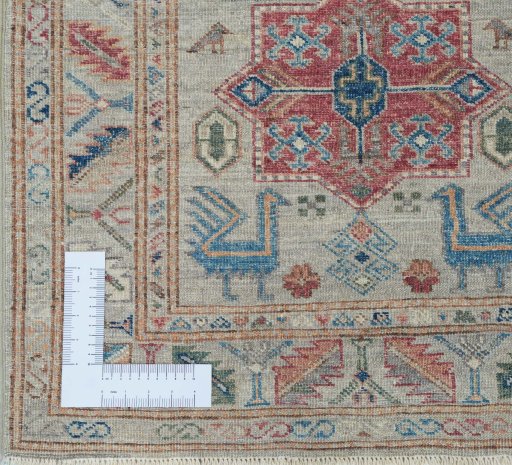 Corner detail of New Kazak rug showing border pattern and Wool pile