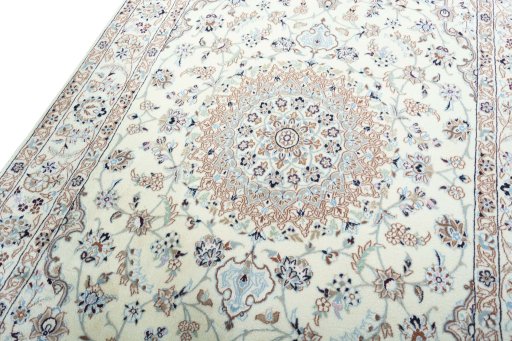 Backside of handmade New Nain rug showing knot structure and weave density
