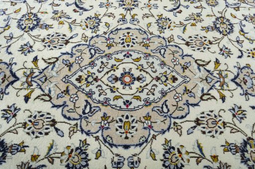 Central medallion detail of 2000s Kashan rug from Iran / Persia