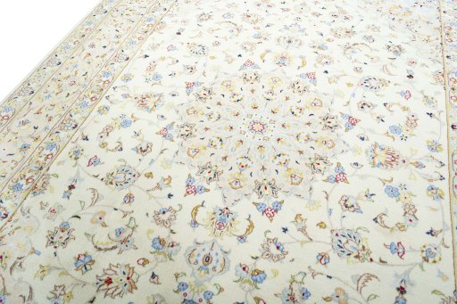 Backside of handmade New Kashan rug showing knot structure and weave density
