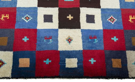 Central medallion detail of 2000s Persian Gabbeh rug from Pakistan
