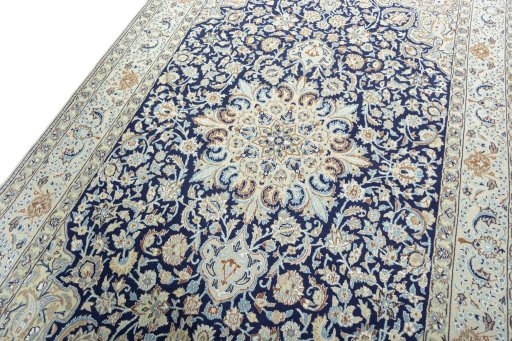 Backside of handmade 2000s Nain rug showing knot structure and weave density