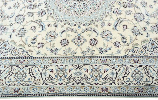 Corner detail of 2000s Nain rug showing border pattern and Wool pile