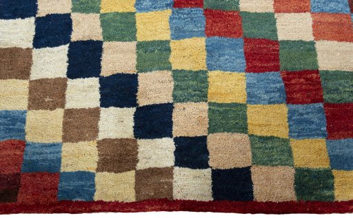Central medallion detail of 2000s Persian Gabbeh rug from Pakistan