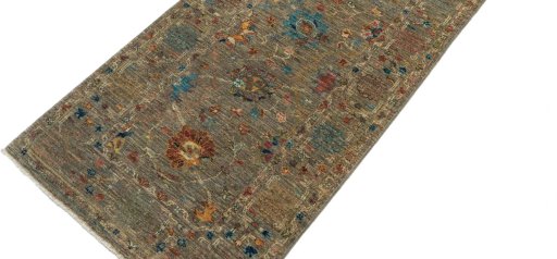 Backside of handmade New Farahan rug showing knot structure and weave density