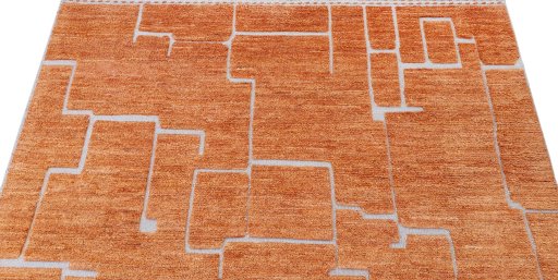 Backside of handmade New Morocco rug showing knot structure and weave density