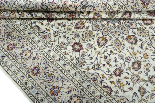 Close-up detail of 2000s Kashan rug from Iran / Persia showing Wool weave