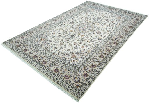 Corner detail of 2000s Kashan rug showing border pattern and Wool pile