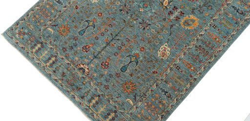 Backside of handmade New Farahan rug showing knot structure and weave density