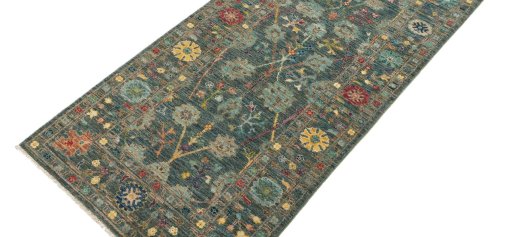 Backside of handmade New Farahan rug showing knot structure and weave density