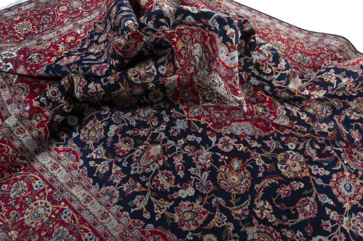 Surface texture of 2000s Kashan rug with natural Cork and intricate pattern