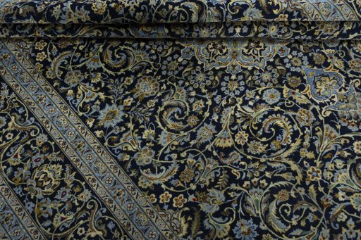 Close-up detail of New Kashan rug from Iran / Persia showing Cork weave