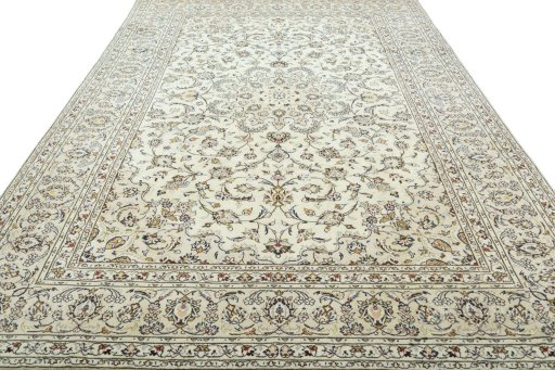 Surface texture of 2000s Kashan rug with natural Wool and intricate pattern