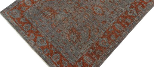 Backside of handmade New Farahan rug showing knot structure and weave density