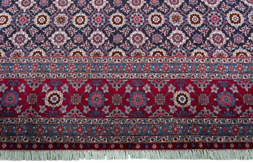 Central medallion detail of 2000s Mashad rug from Iran / Persia