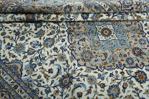 Close-up detail of 2000s Kashan rug from Iran / Persia showing Wool weave