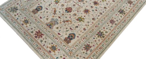 Backside of handmade New Farahan rug showing knot structure and weave density