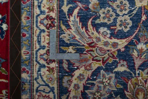 Backside of handmade 2000s Najafabad rug showing knot structure and weave density