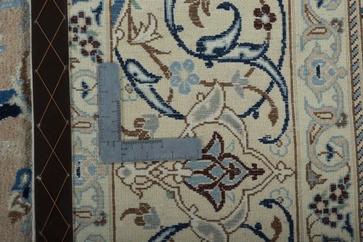 Backside of handmade 2000s Nain rug showing knot structure and weave density