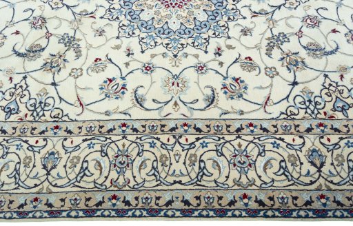 Corner detail of 2000s Nain rug showing border pattern and Wool pile