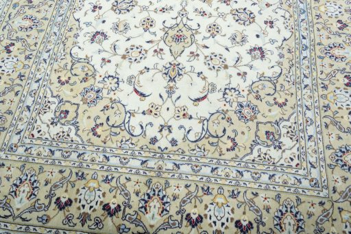 Close-up detail of 2000s Kashan rug from Iran / Persia showing Wool weave