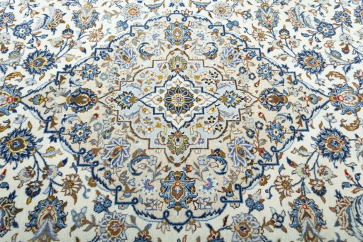 Central medallion detail of 2000s Kashan rug from Iran / Persia