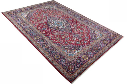 Close-up detail of New Kashan rug from Iran / Persia showing Wool weave