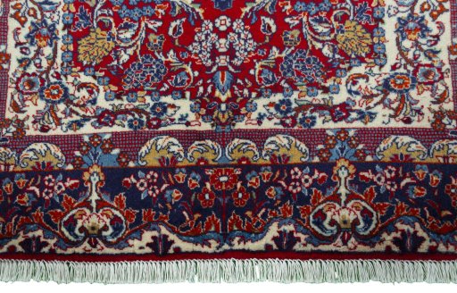 Close-up detail of 2000s Jozan rug from Iran / Persia showing Wool weave