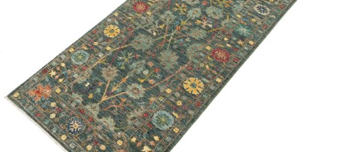 Backside of handmade New Farahan rug showing knot structure and weave density