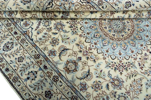 Close-up detail of 2000s Nain rug from Iran / Persia showing Wool weave