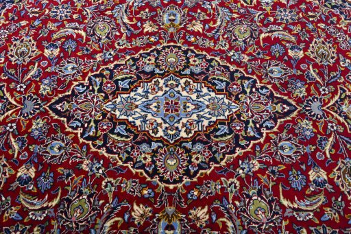 Central medallion detail of 2000s Kashan rug from Iran / Persia