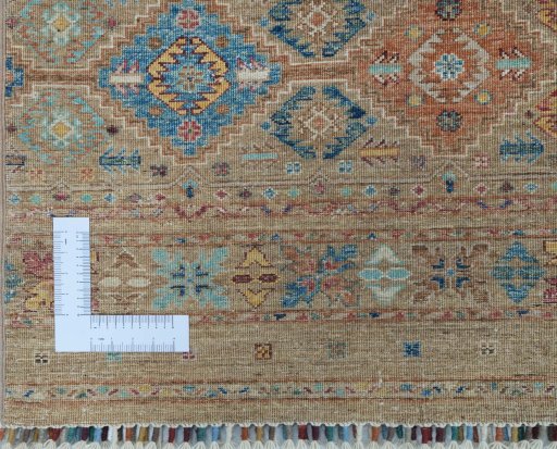 Corner detail of New Samarkand rug showing border pattern and Wool pile