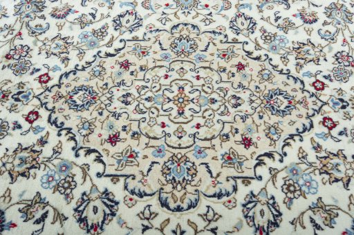 Central medallion detail of 2000s Kashan rug from Iran / Persia