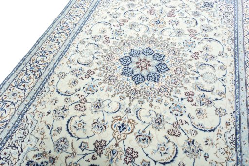 Backside of handmade 2000s Nain rug showing knot structure and weave density