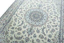Backside of handmade 2000s Nain rug showing knot structure and weave density