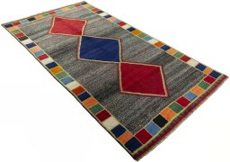 Close-up detail of 1970s Persian Gabbeh rug from Iran / Persia showing Wool weave