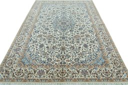 Surface texture of 2000s Nain rug with natural Wool and intricate pattern
