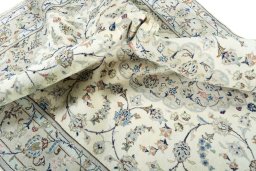 Surface texture of New Kashan rug with natural Wool and intricate pattern
