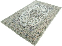Corner detail of New Kashan rug showing border pattern and Wool pile