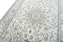 Backside of handmade 2000s Nain rug showing knot structure and weave density