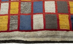 Central medallion detail of 2000s Persian Gabbeh rug from Pakistan
