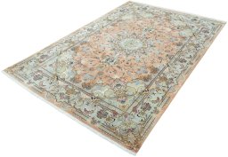 Corner detail of 2000s Tabriz 50/60/70 Raj rug showing border pattern and Cork pile