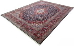 Corner detail of New Kashan rug showing border pattern and Cork pile