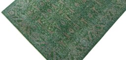 Backside of handmade New Farahan rug showing knot structure and weave density