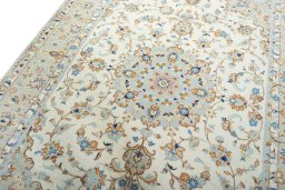 Backside of handmade New Kashan rug showing knot structure and weave density