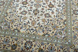 Close-up detail of 2000s Kashan rug from Iran / Persia showing Wool weave