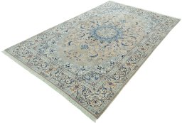 Corner detail of 2000s Nain rug showing border pattern and Wool pile