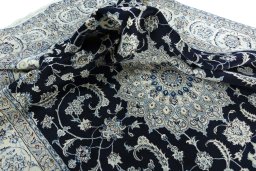 Surface texture of New Nain rug with natural Wool and intricate pattern