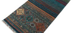 Backside of handmade New Samarkand rug showing knot structure and weave density